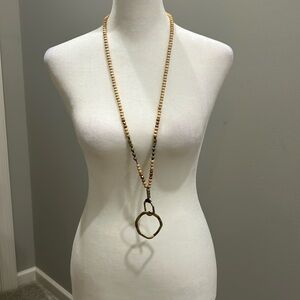 Necklace with Wooden beads with metal accents.   Adjustable.